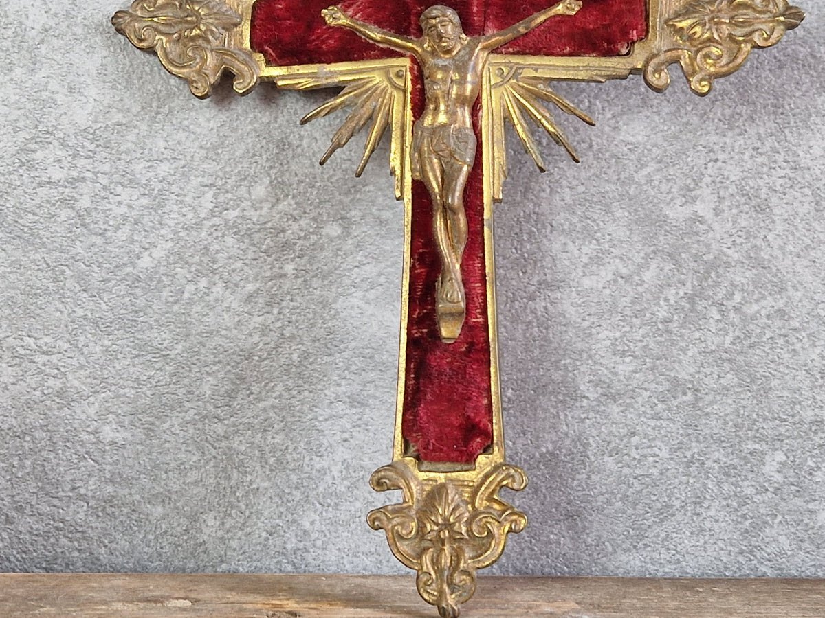 French antique crucifix with red velvet and sunburst design.