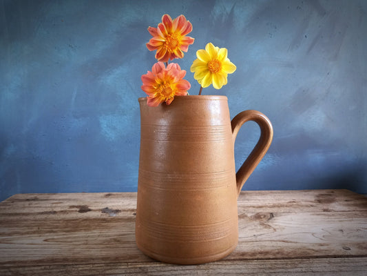 French vintage stoneware jug with yellow flowers.