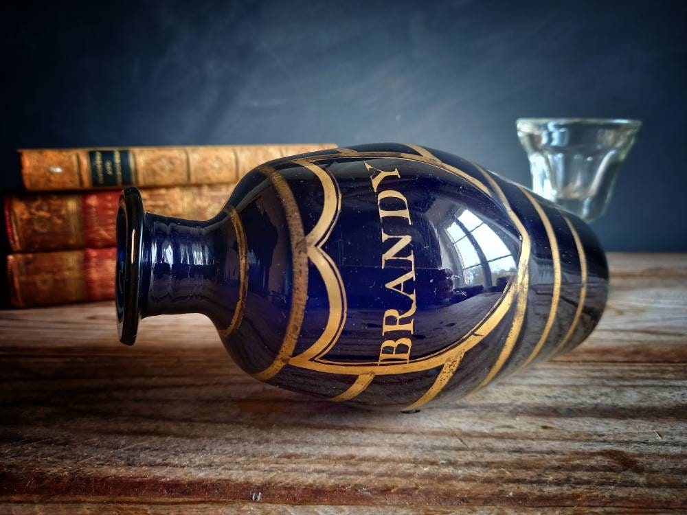 Antique blue Brandy bottle. Old blue bottle. Regency bottle. Antique decanter.