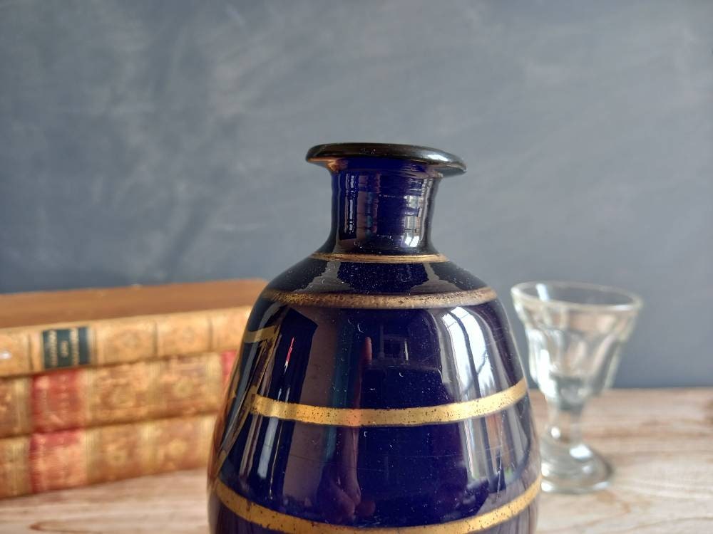 Antique blue Brandy bottle. Old blue bottle. Regency bottle. Antique decanter.