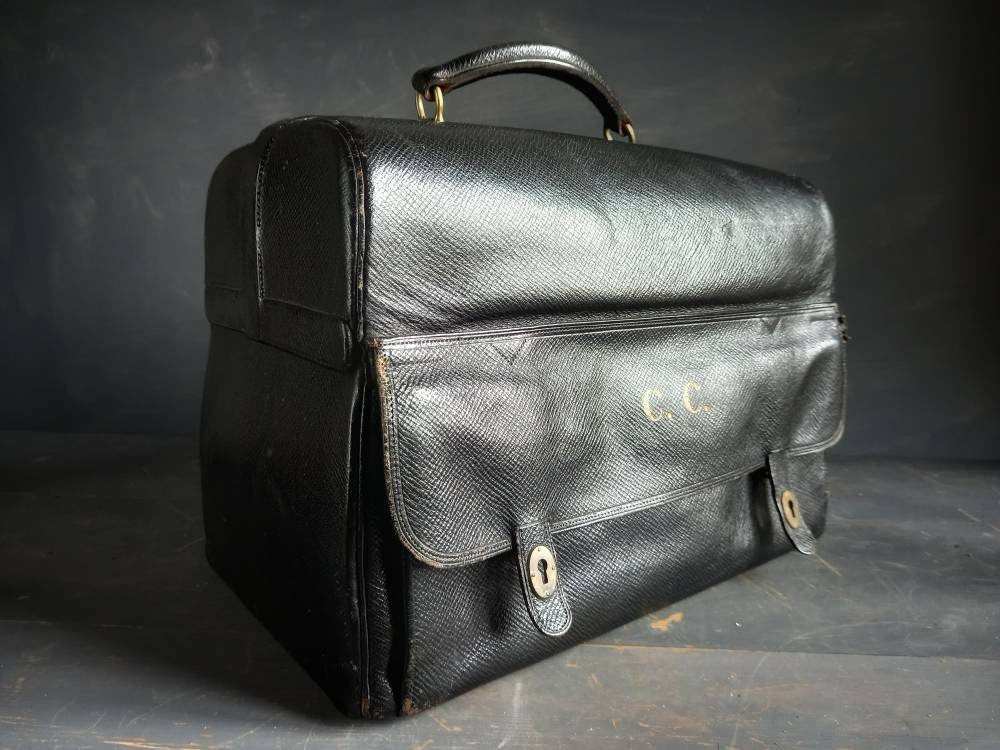 Mappin and Webb black leather antique vanity case. Mappin and Webb luggage.