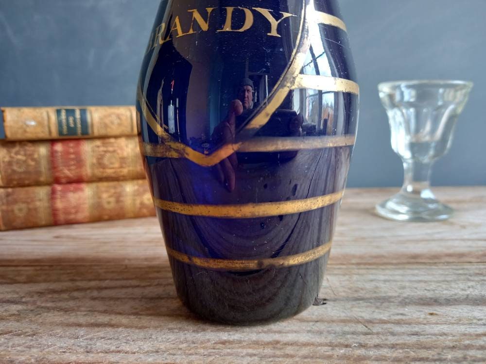 Antique blue Brandy bottle. Old blue bottle. Regency bottle. Antique decanter.