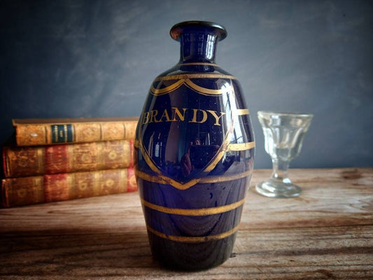 Antique blue Brandy bottle. Old blue bottle. Regency bottle. Antique decanter.
