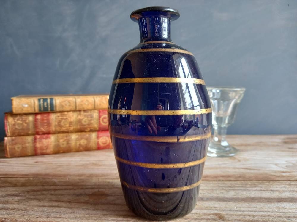 Antique blue Brandy bottle. Old blue bottle. Regency bottle. Antique decanter.