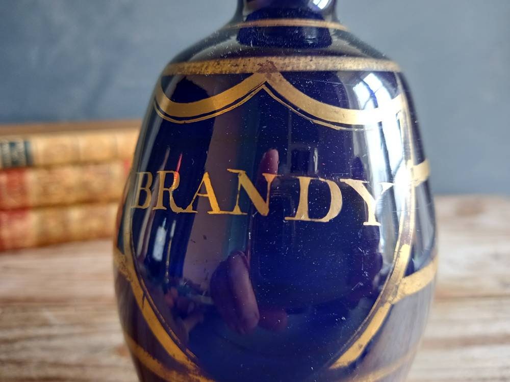 Antique blue Brandy bottle. Old blue bottle. Regency bottle. Antique decanter.
