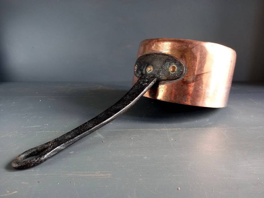 Antique copper pan. Copper pot. Copper saucepan.