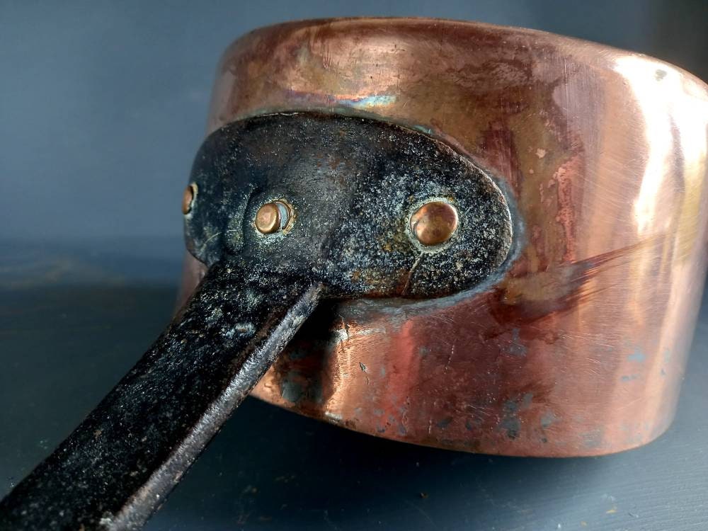 Antique copper pan. Copper pot. Copper saucepan.