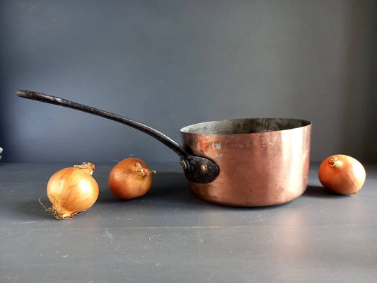 Antique copper pan. Copper pot. Copper saucepan.