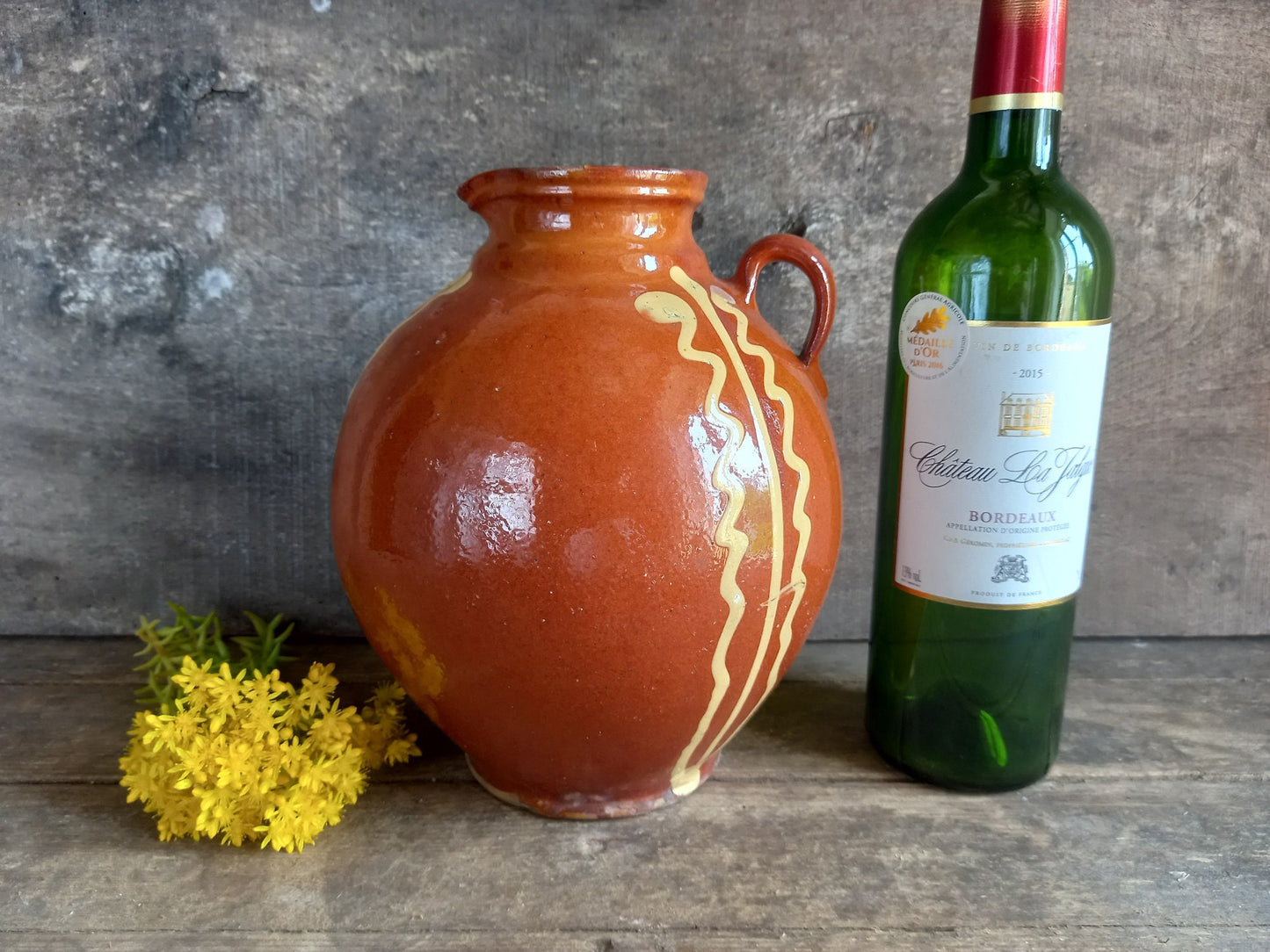 Large French vintage country jug decorated with slip.