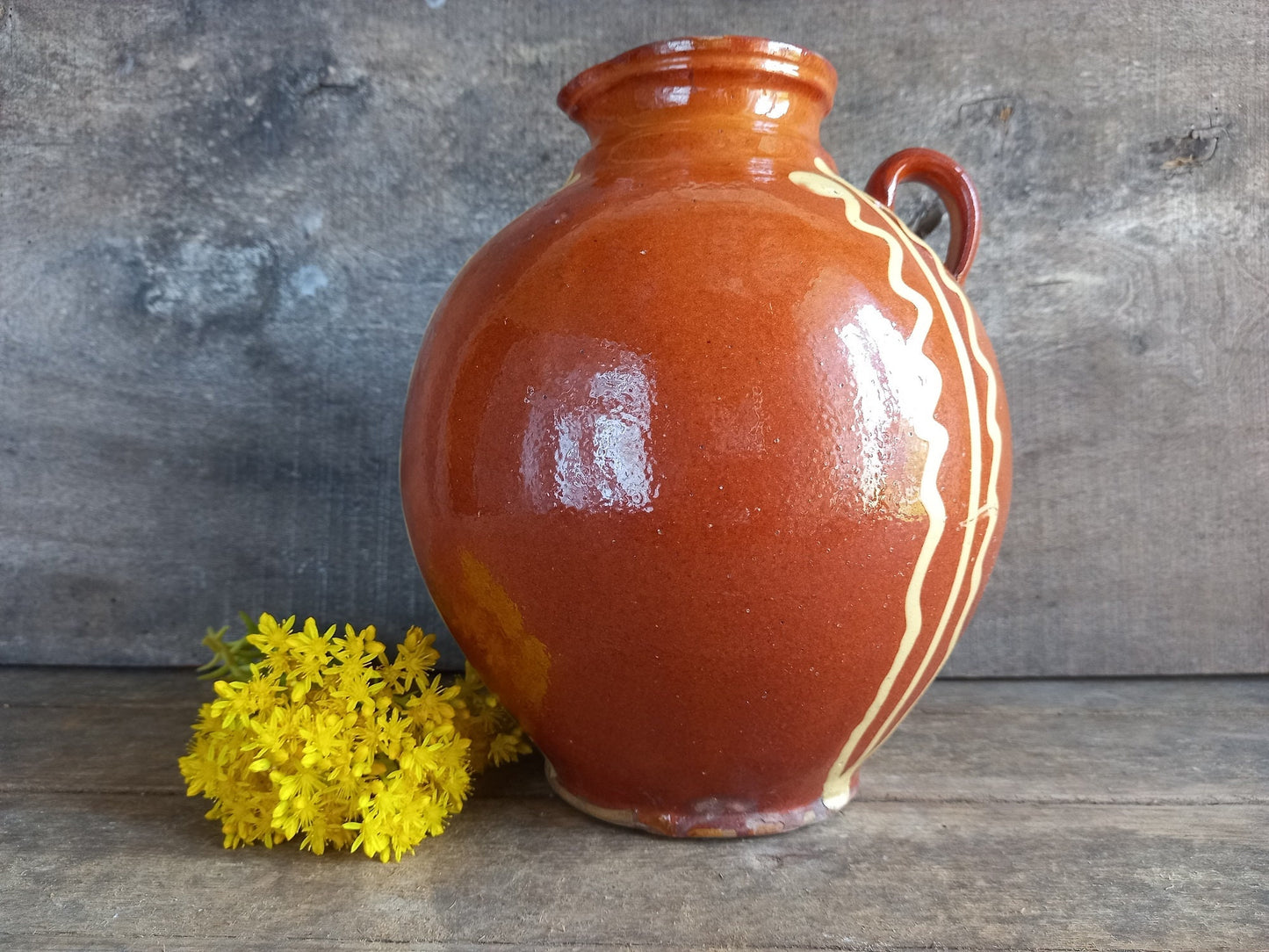 Large French vintage country jug decorated with slip.