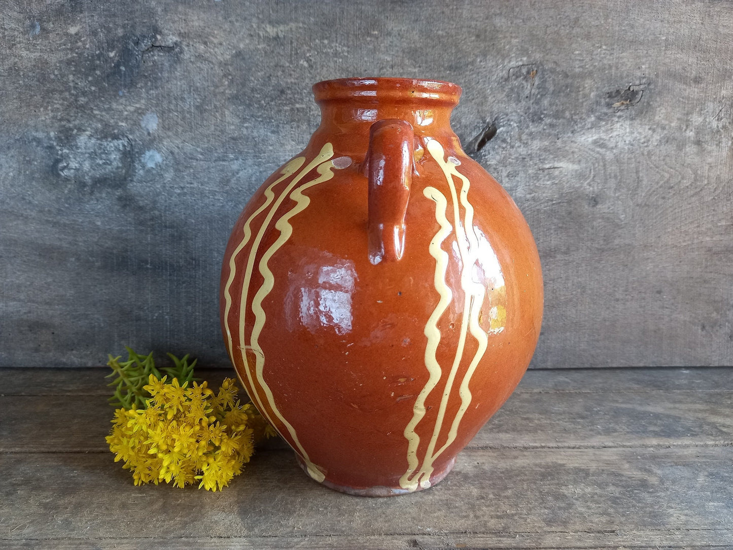 Large French vintage country jug decorated with slip.
