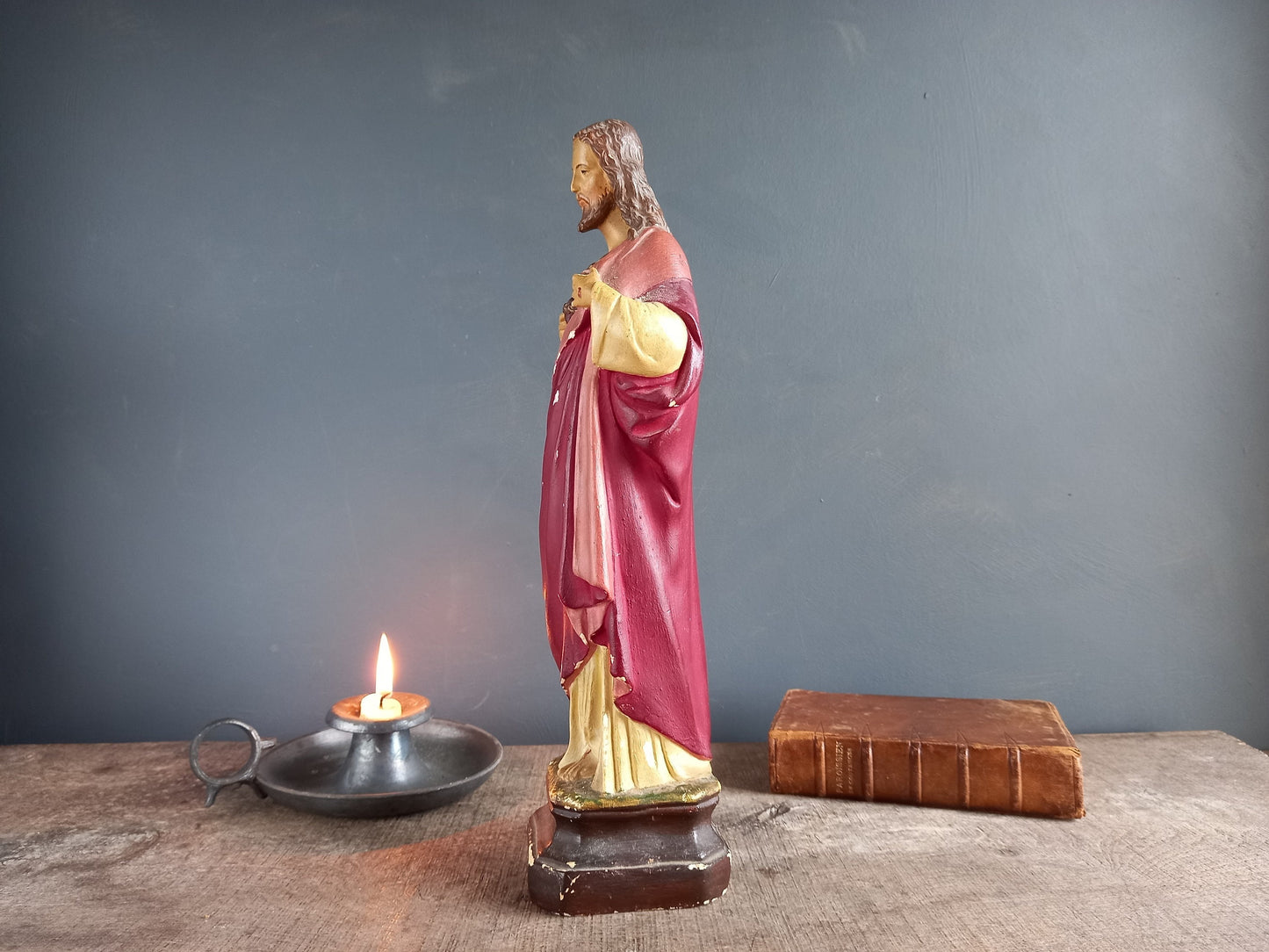 French antique Jesus statue. Religious statue.