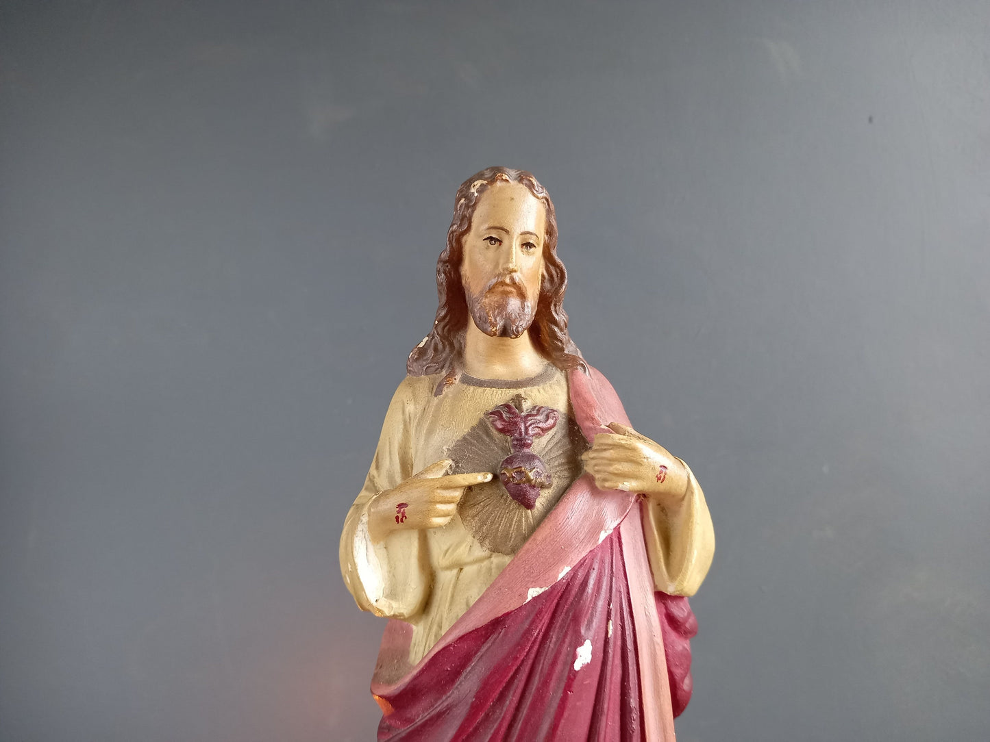 French antique Jesus statue. Religious statue.