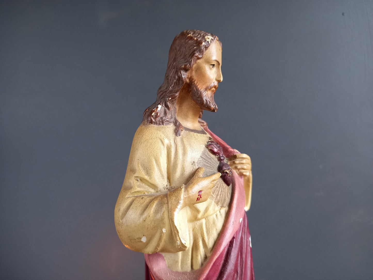 French antique Jesus statue. Religious statue.