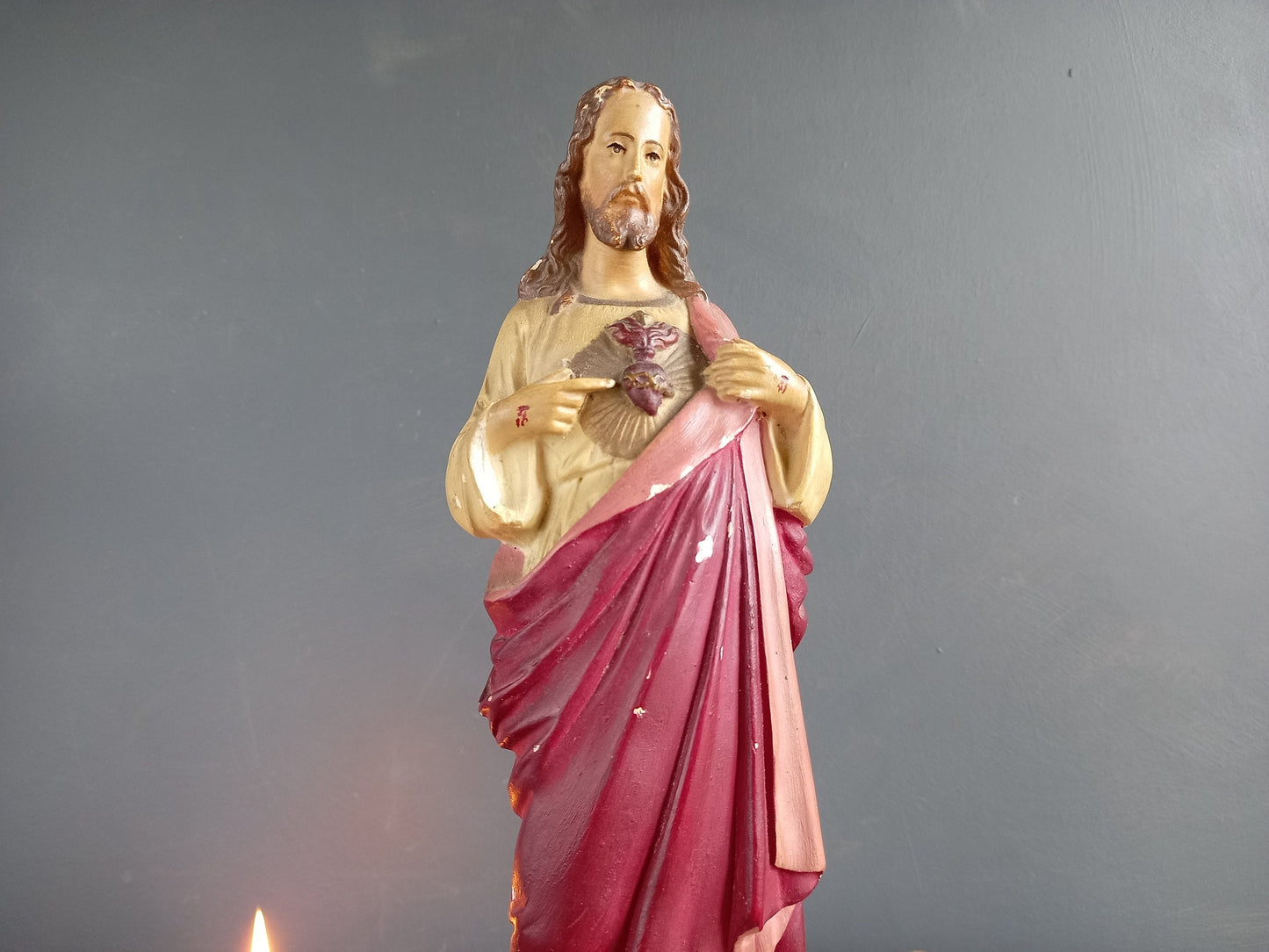 French antique Jesus statue. Religious statue.