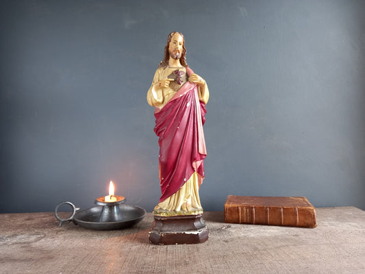 French antique Jesus statue. Religious statue.