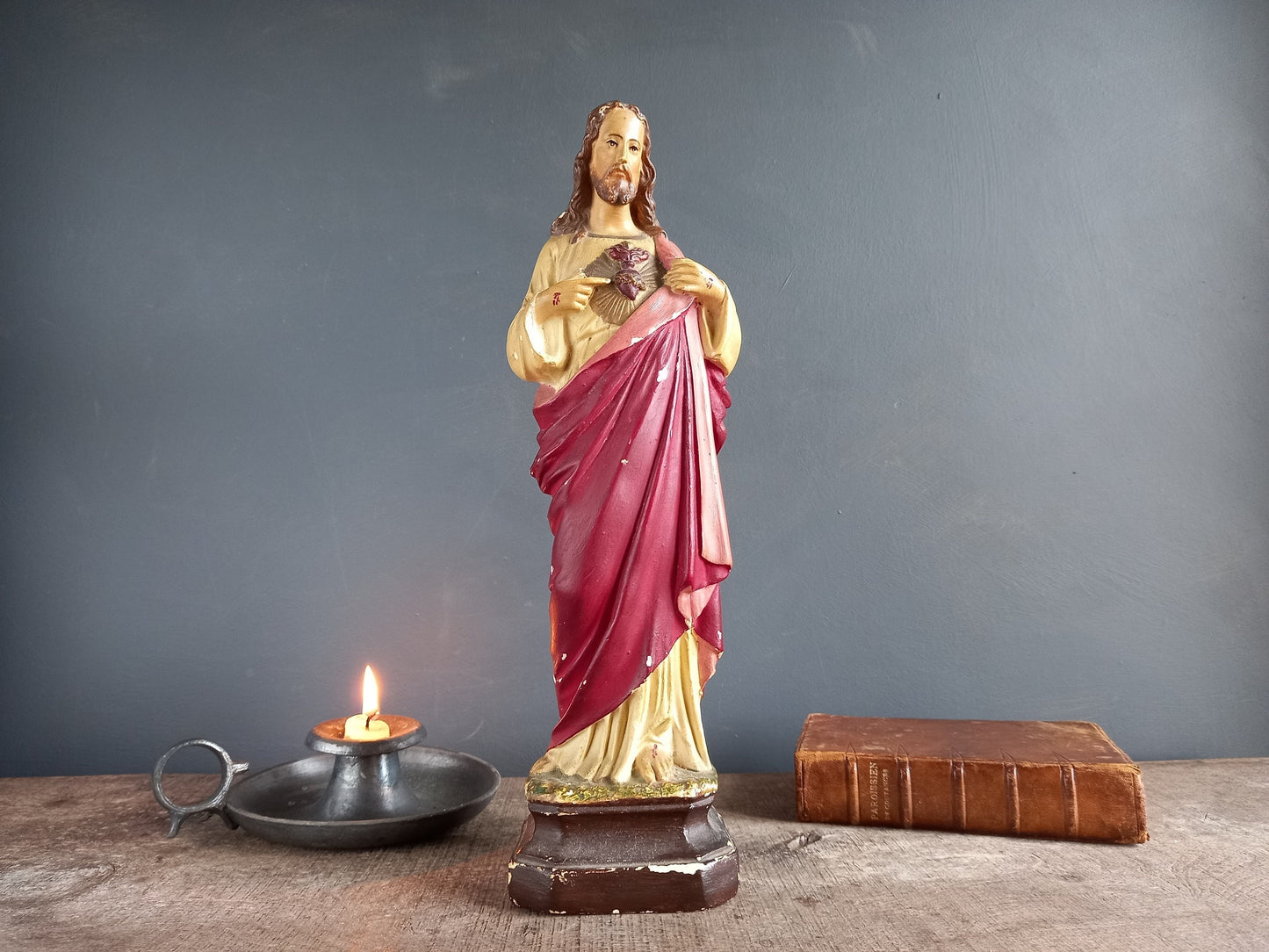 French antique Jesus statue. Religious statue.