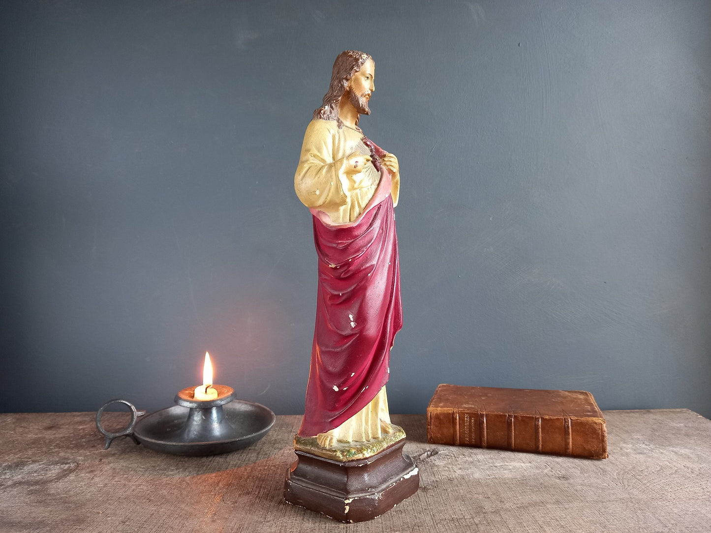 French antique Jesus statue. Religious statue.