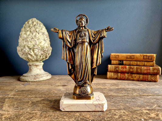 French spelter Jesus statue on marble base.