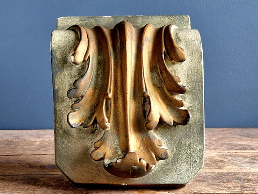 French plaster corbel with ornate decoration.