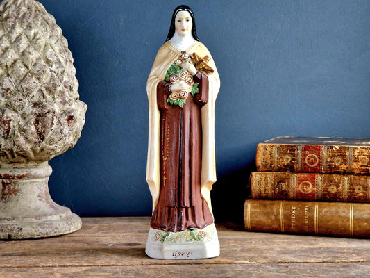 French statue St Therese of Lisieux Bisque porcelain statue .