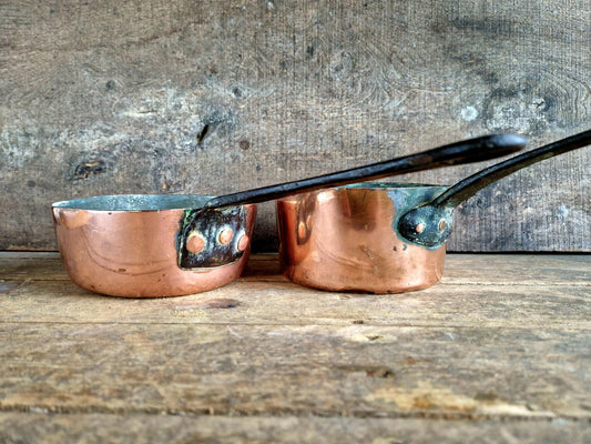 French copper pots and pans.Antique copper pans.