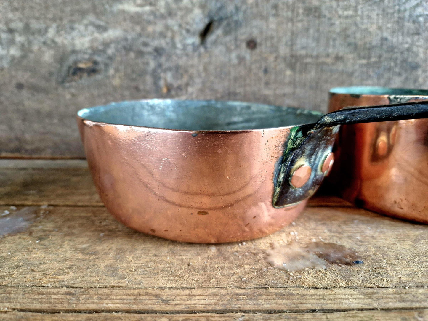 French copper pots and pans.Antique copper pans.