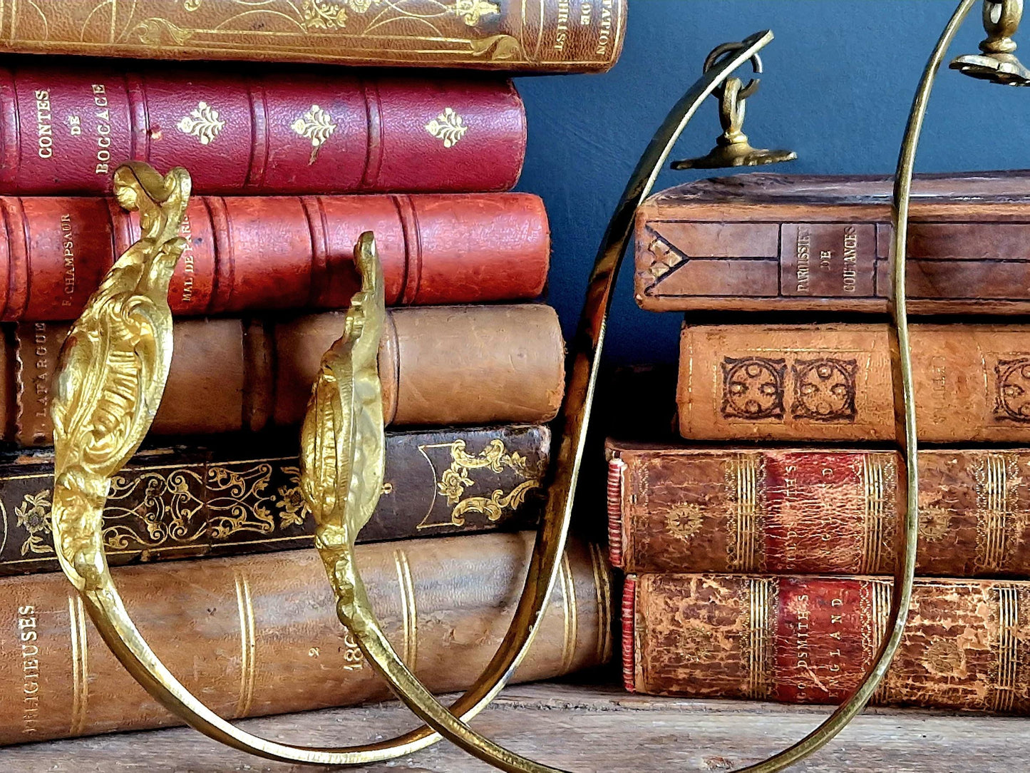 French gilt brass curtain tiebacks. Pair of French rococo style gilt brass tiebacks.