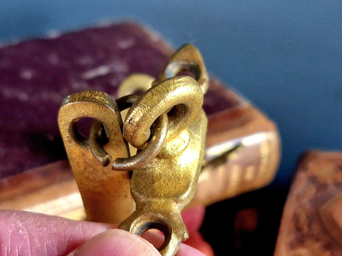 French gilt brass curtain tiebacks. Pair of French rococo style gilt brass tiebacks.