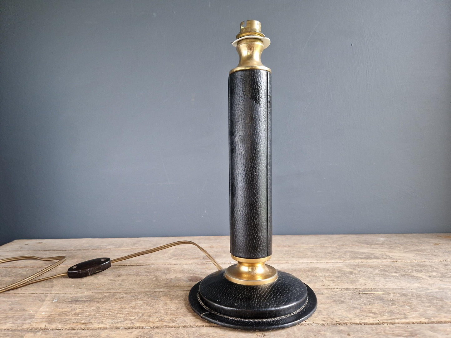 French vintage black leather lamp in the manner of Jacques Adnet Le tanneur table lamp.
