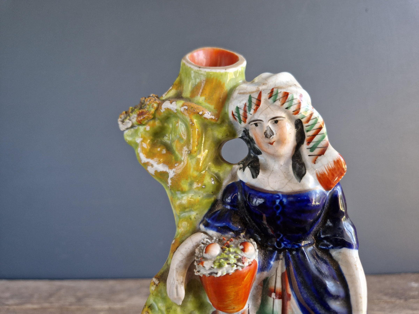 Antique Staffordshire flatback statue of a girl with a swan.