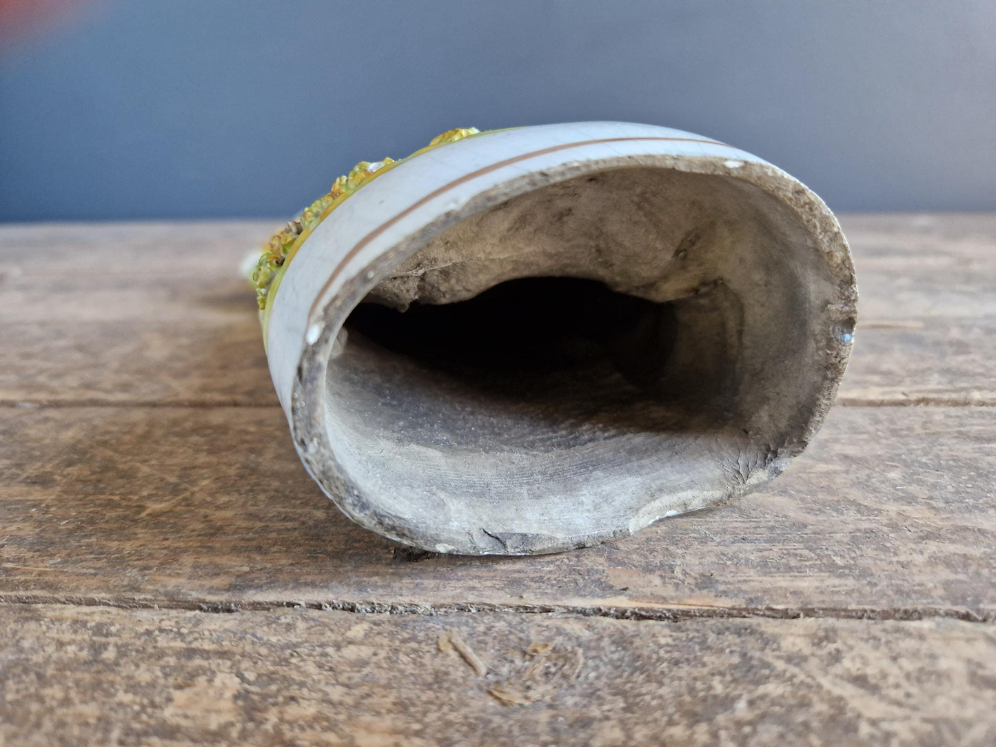 Antique Staffordshire flatback statue of a girl with a swan.