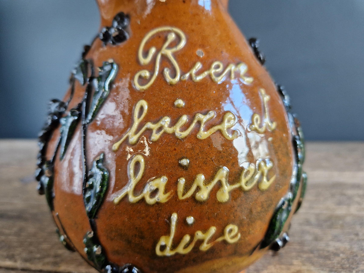 French country beer jug. Country pitcher. Old French jug with beer saying decoration.