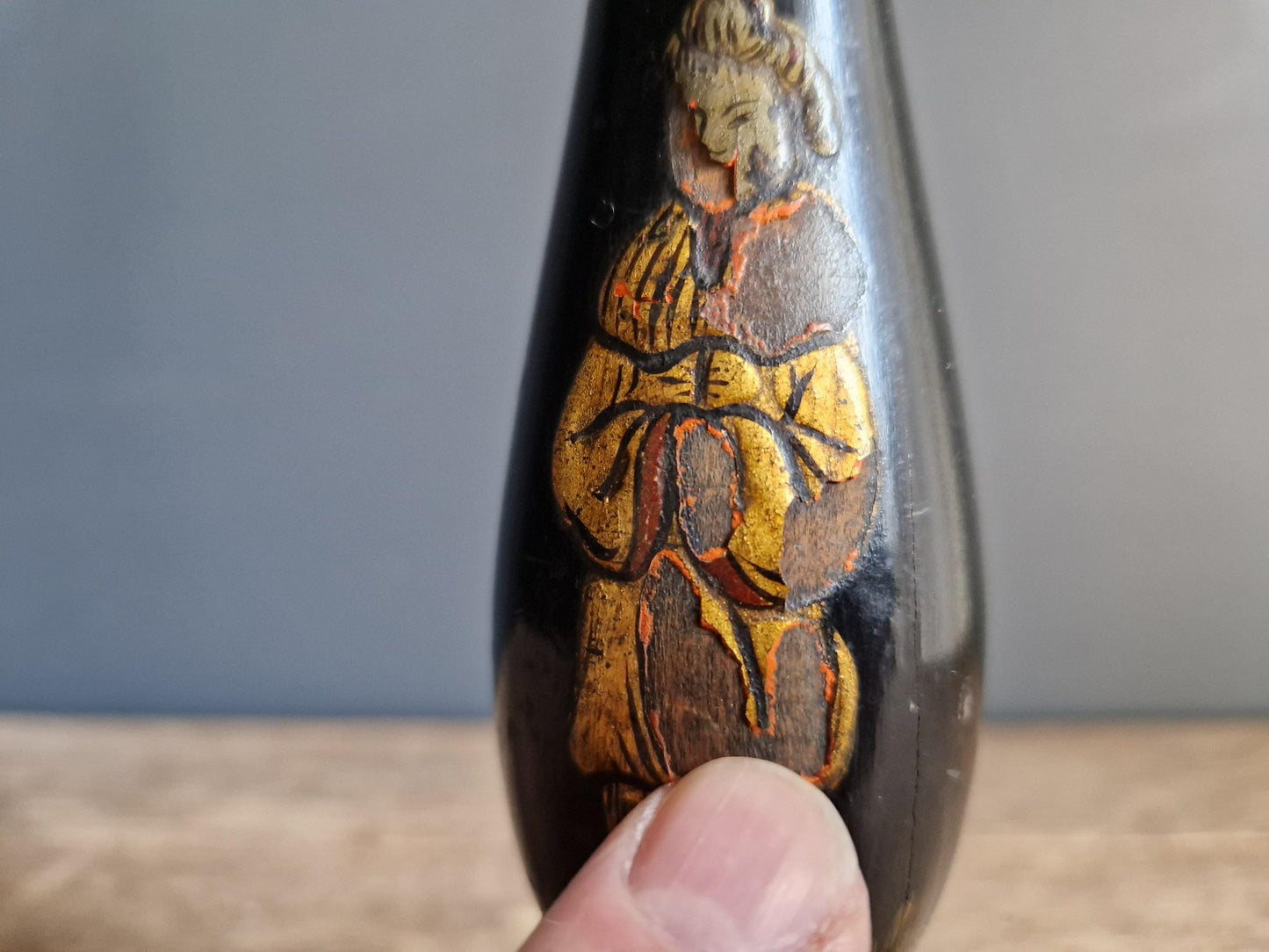 Antique Chinoiserie black table lamp with gilt highlight decoration.