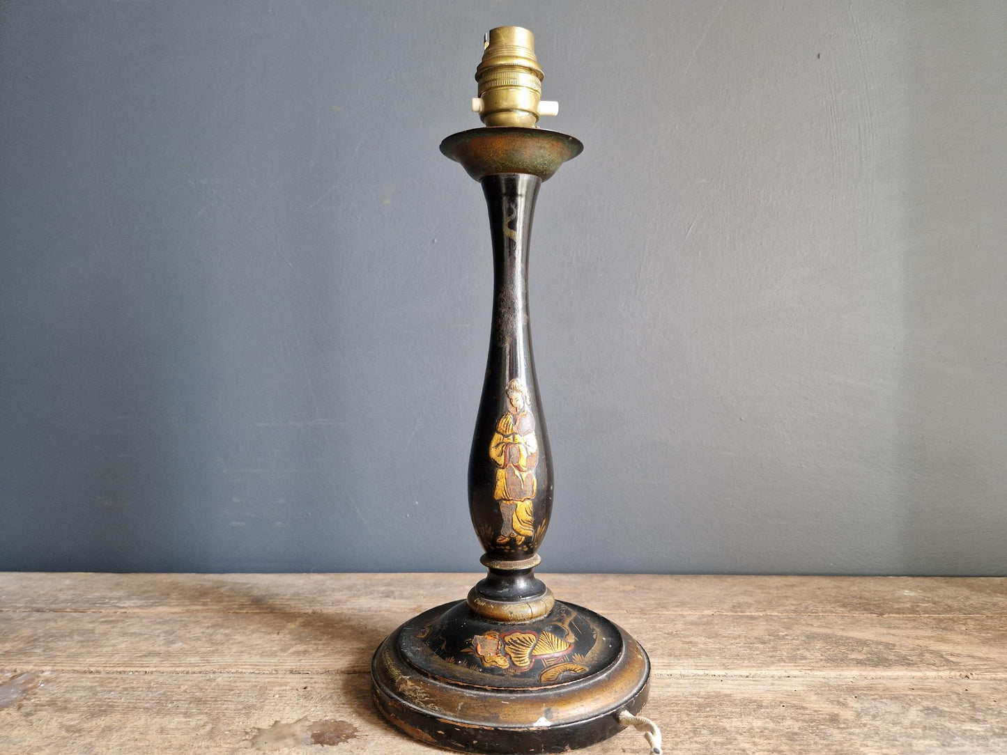 Antique Chinoiserie black table lamp with gilt highlight decoration.
