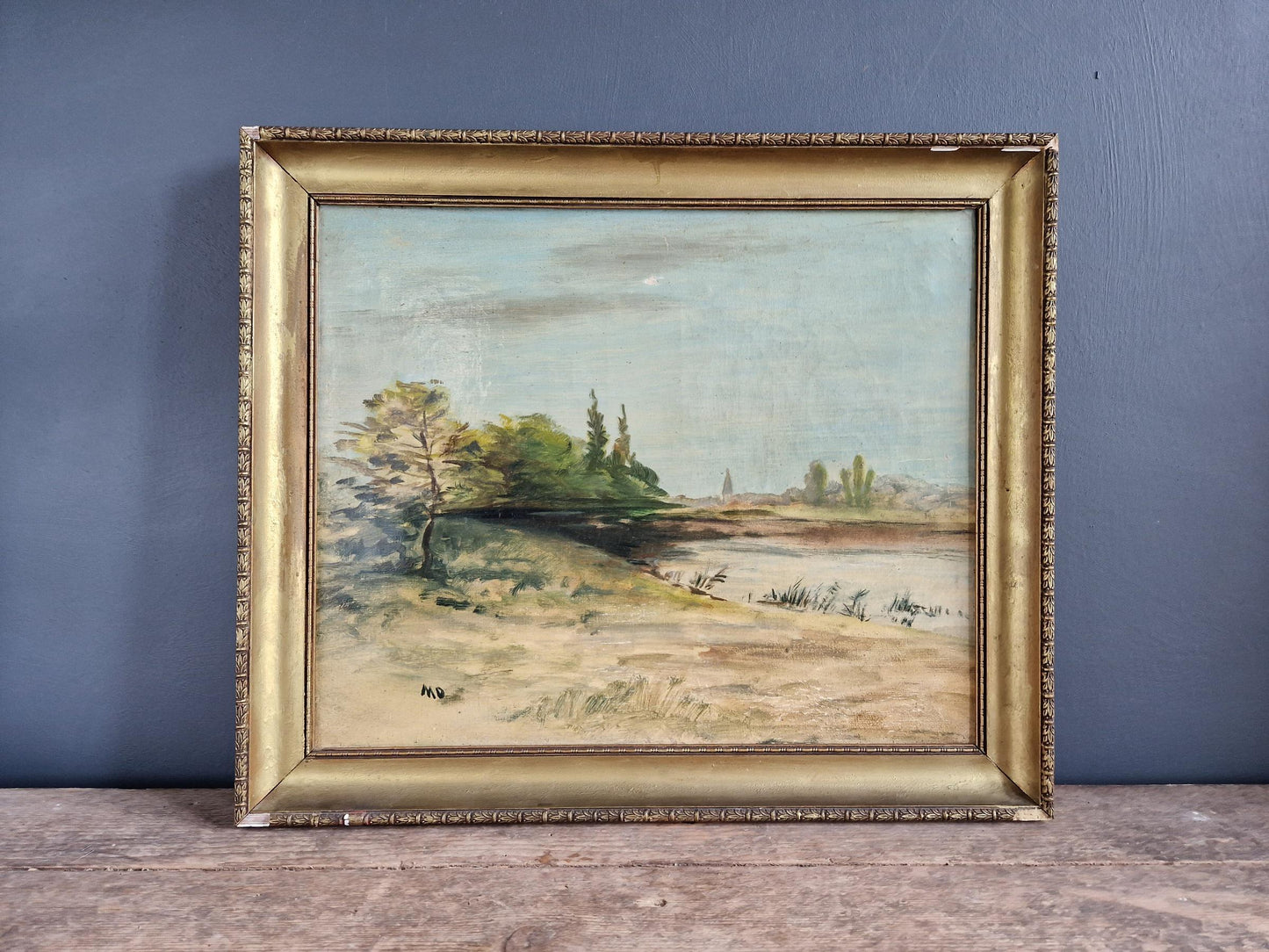 Antique oil painting of a lakeside scene. French oil painting.