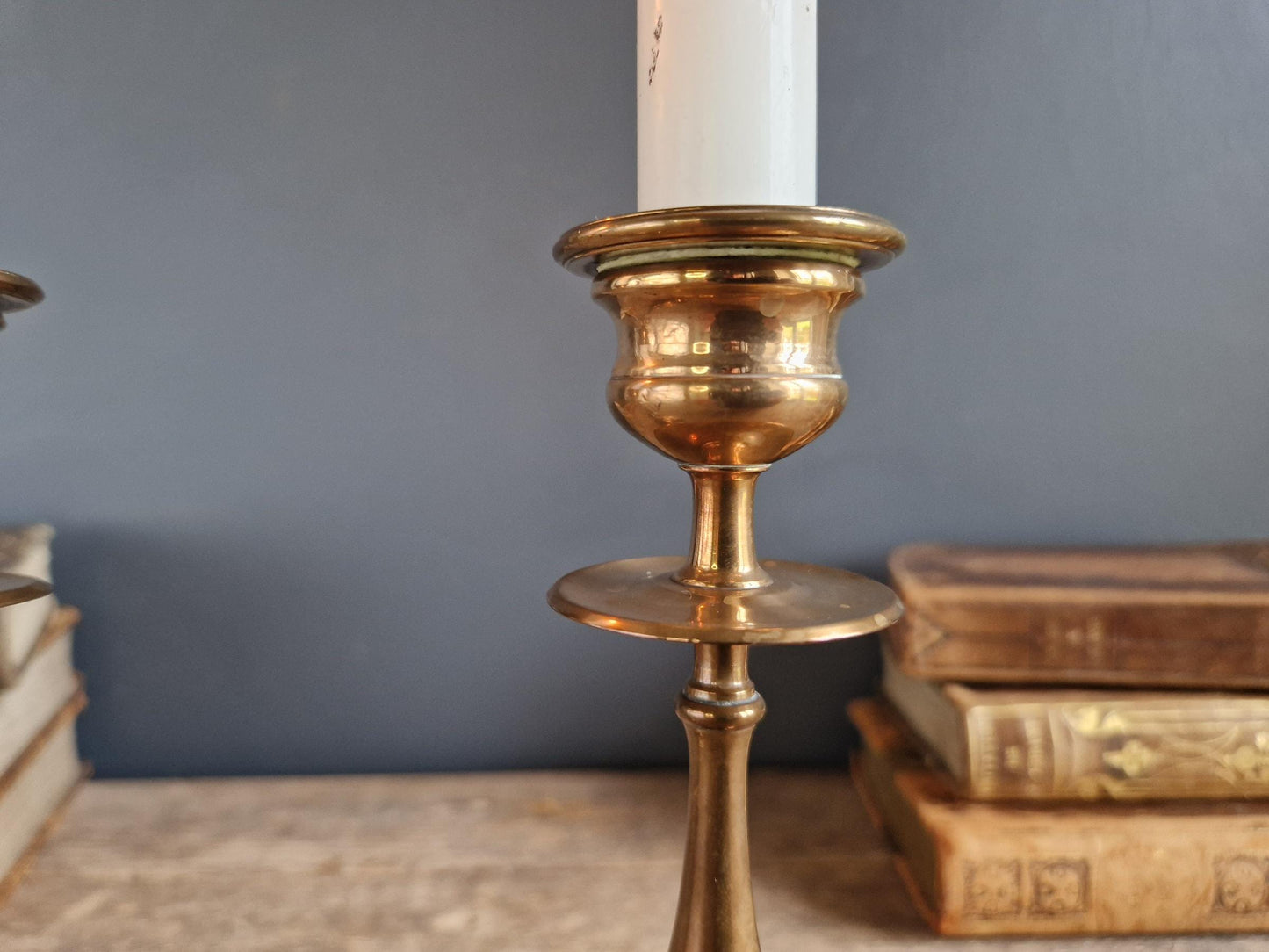 French antique candlesticks. Antique brass candle holders with wax drip plate beneath.