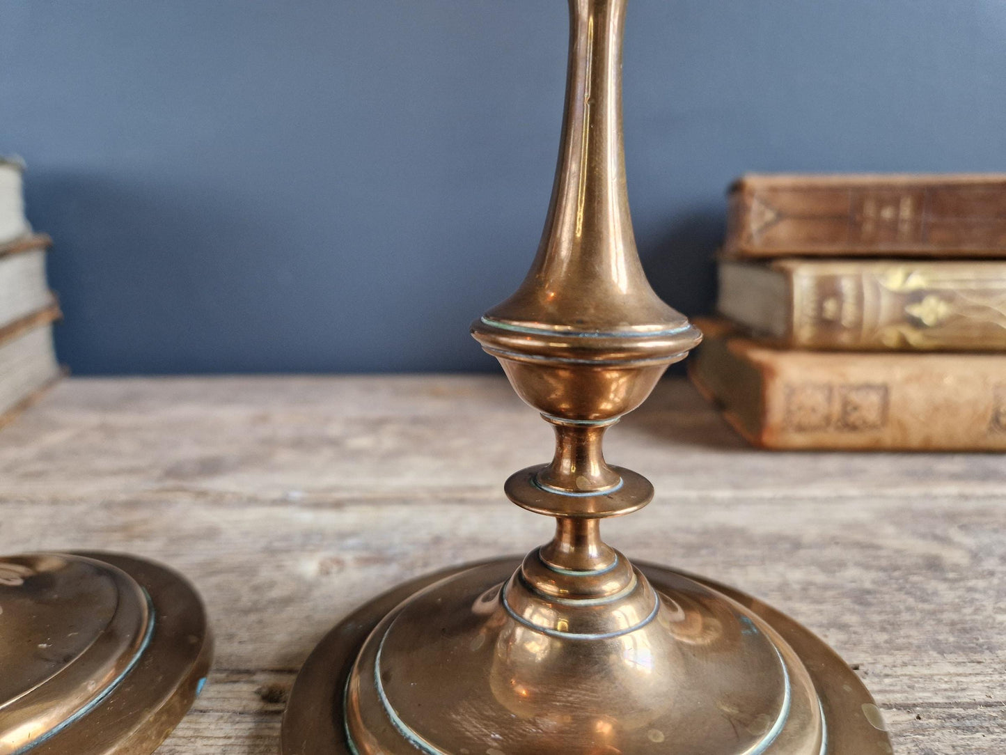 French antique candlesticks. Antique brass candle holders with wax drip plate beneath.