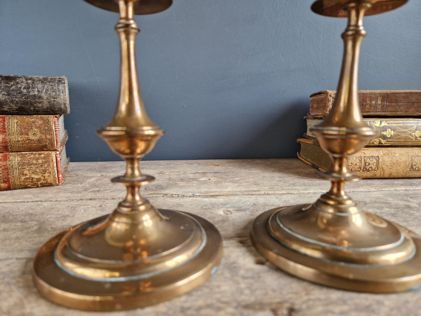 French antique candlesticks. Antique brass candle holders with wax drip plate beneath.