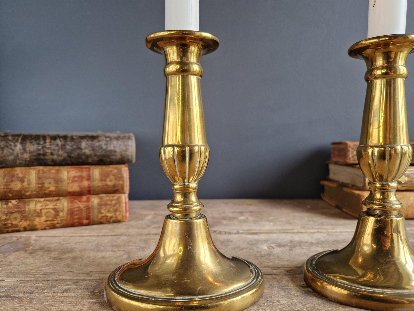 French antique candlesticks. Pair of brass antique French candlesticks with oval bases.