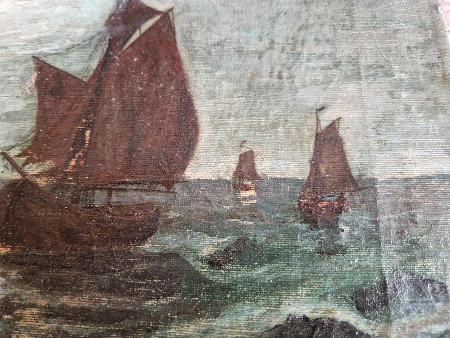French antique seascape oil painting showing fishing boats on the sea in the moonlight.