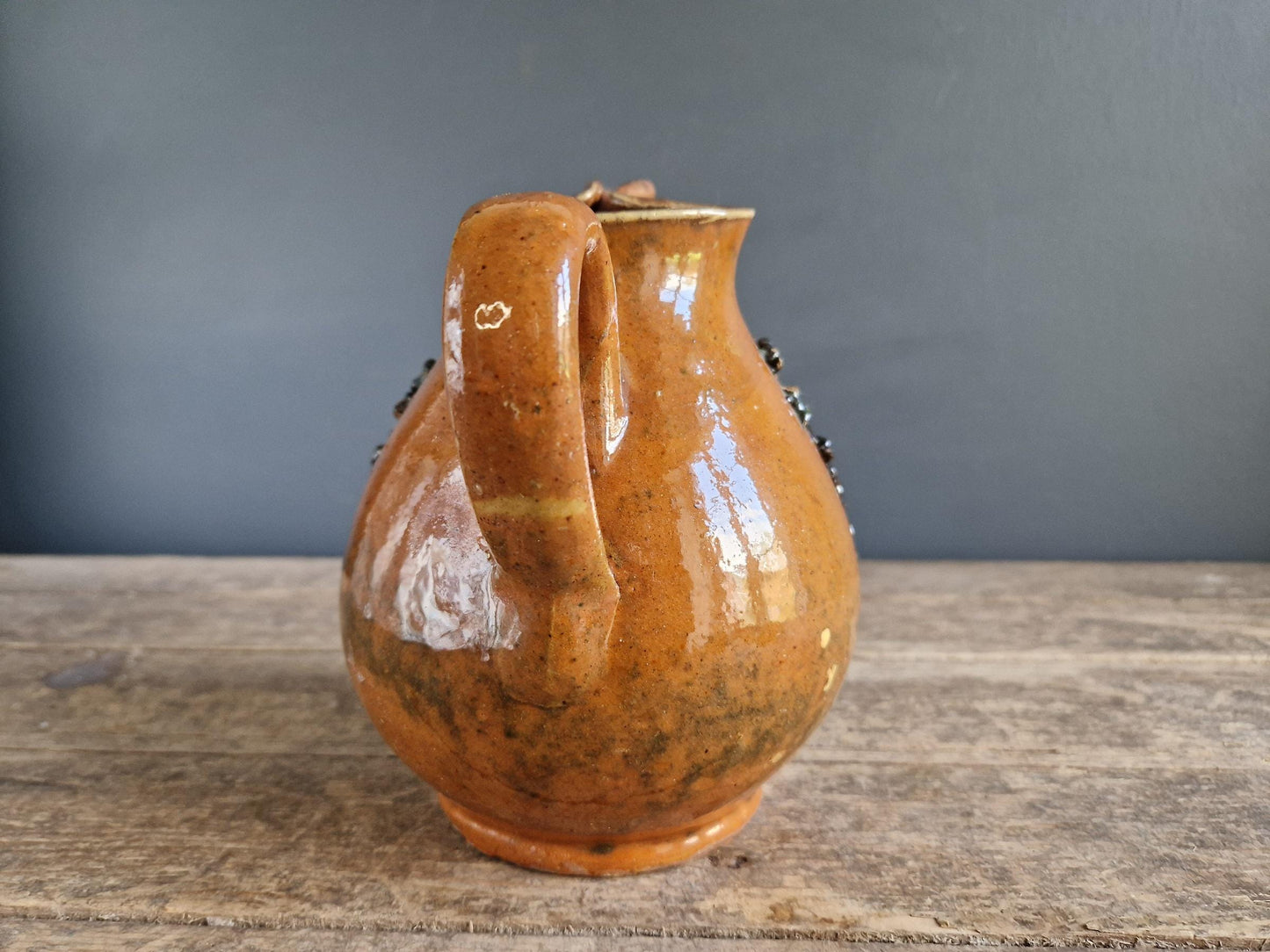 French country beer jug. Country pitcher. Old French jug with beer saying decoration.