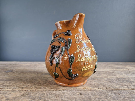 French country beer jug. Country pitcher. Old French jug with beer saying decoration.