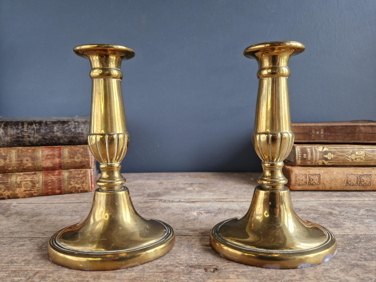 French antique candlesticks. Pair of brass antique French candlesticks with oval bases.