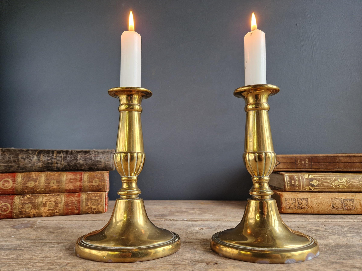 French antique candlesticks. Pair of brass antique French candlesticks with oval bases.