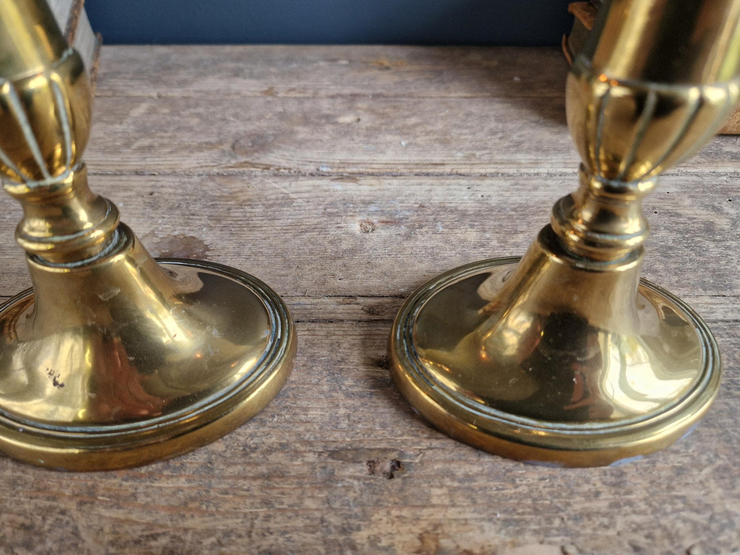 French antique candlesticks. Pair of brass antique French candlesticks with oval bases.