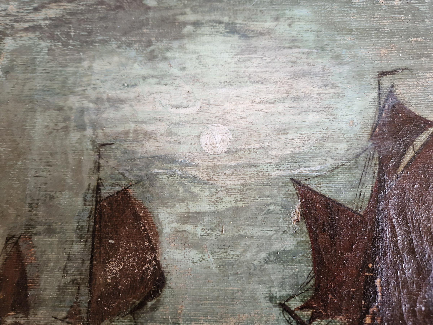 French antique seascape oil painting showing fishing boats on the sea in the moonlight.