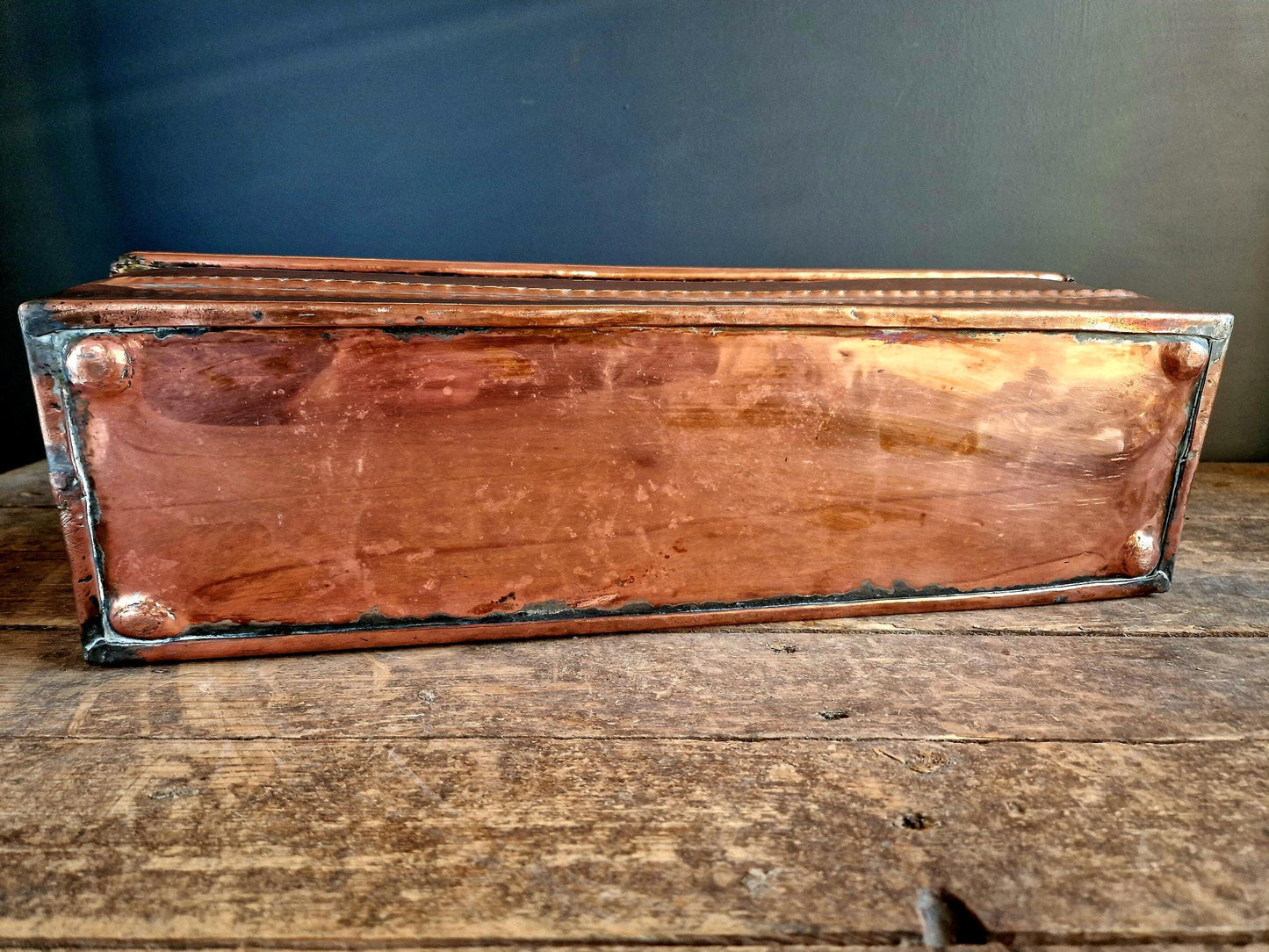 French antique copper planter in a rectangular form.