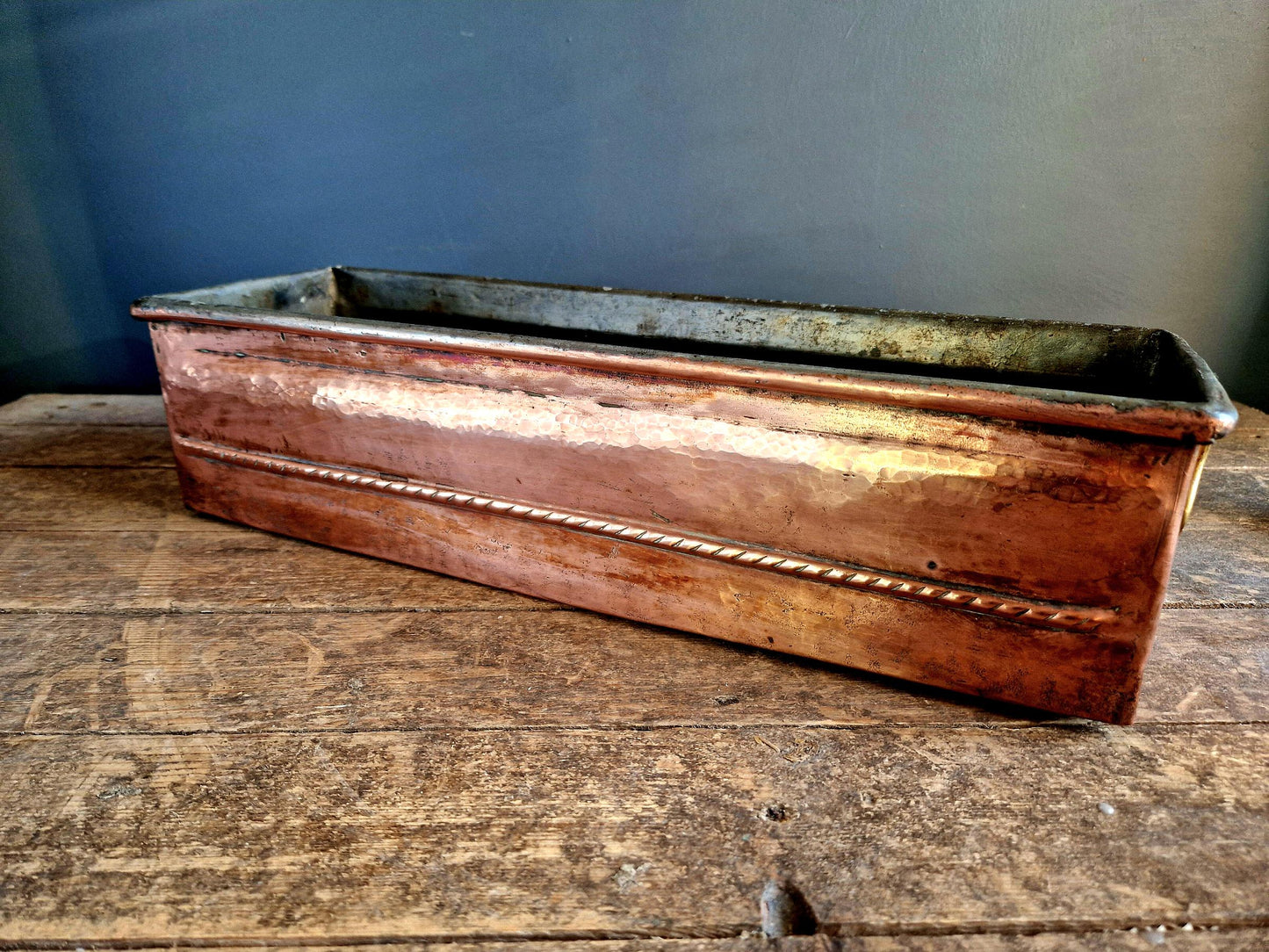 French antique copper planter in a rectangular form.