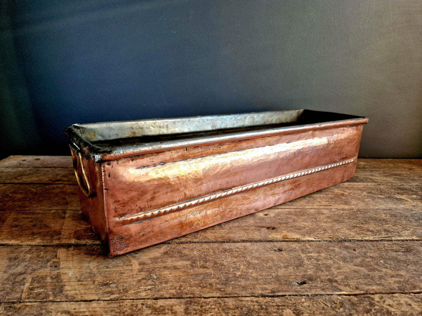French antique copper planter in a rectangular form.